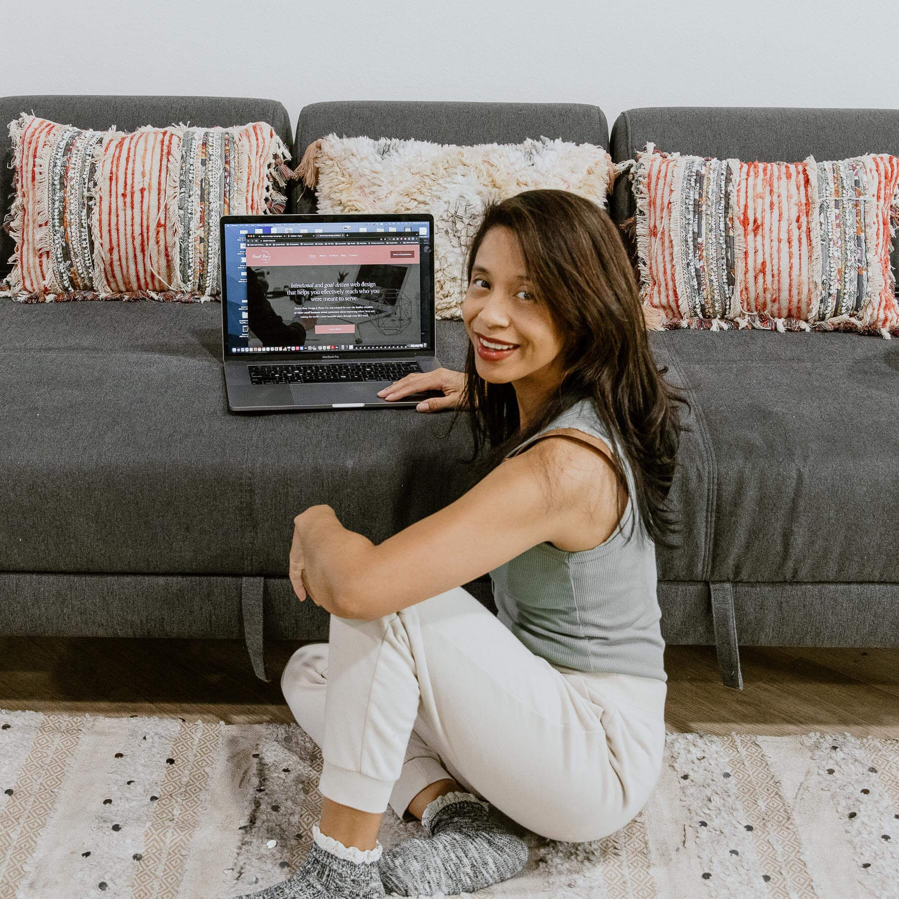 Wordpress and Squarespace web designer Vivian working on a website on her laptop